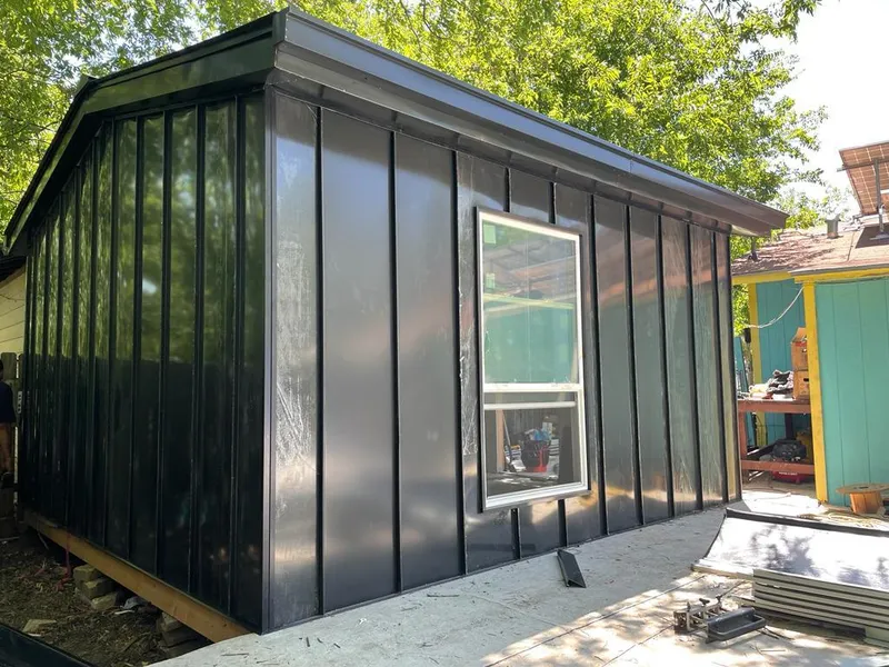 Black standing seam metal wall panels for Roof Inspection in Los Lunas