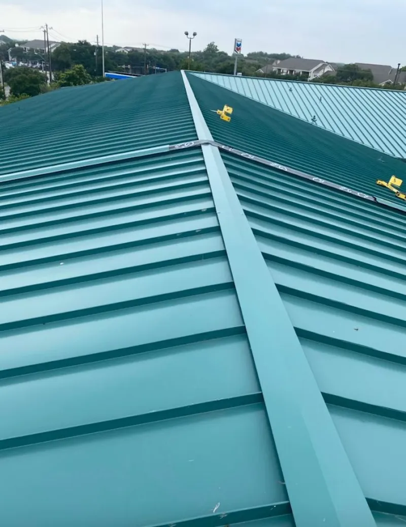 Green commercial metal roof ridge and valley for Metal Roof Repair in Los Lunas